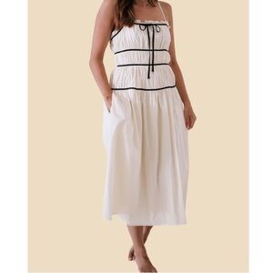 storia monochromatic with contrast lining midi dress